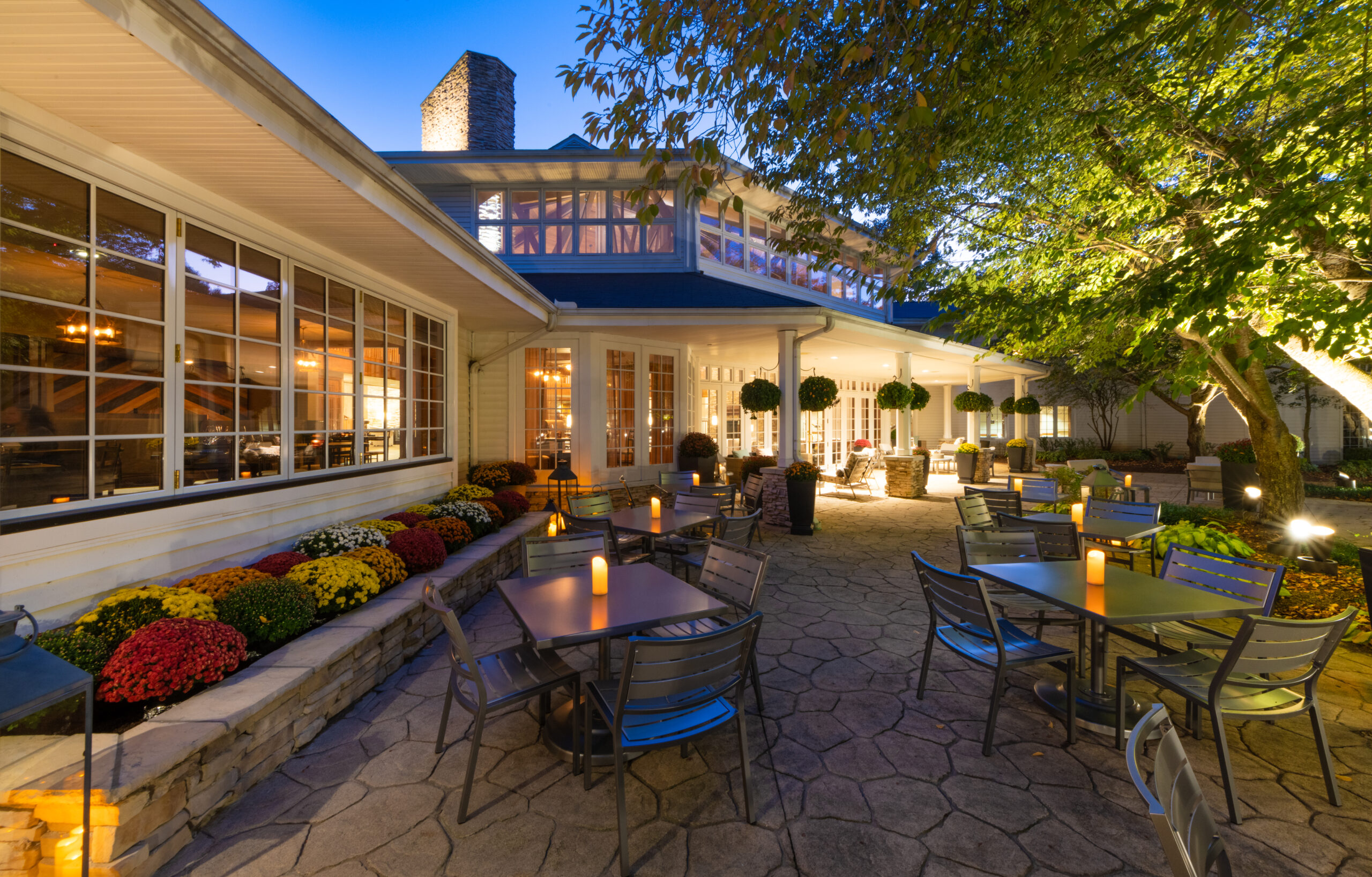 Evening dining on the Craftsman patio at twilight