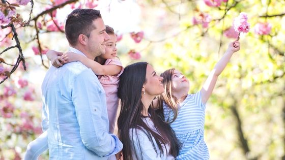 Mother with family outside